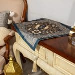 Side table cover with Arabic royal patterns from the 'HOSN' collection.