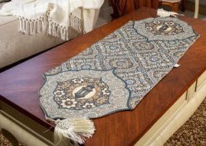 Double-sided Ramadan table runner with Arabic royal patterns from the 'HOSN' collection.