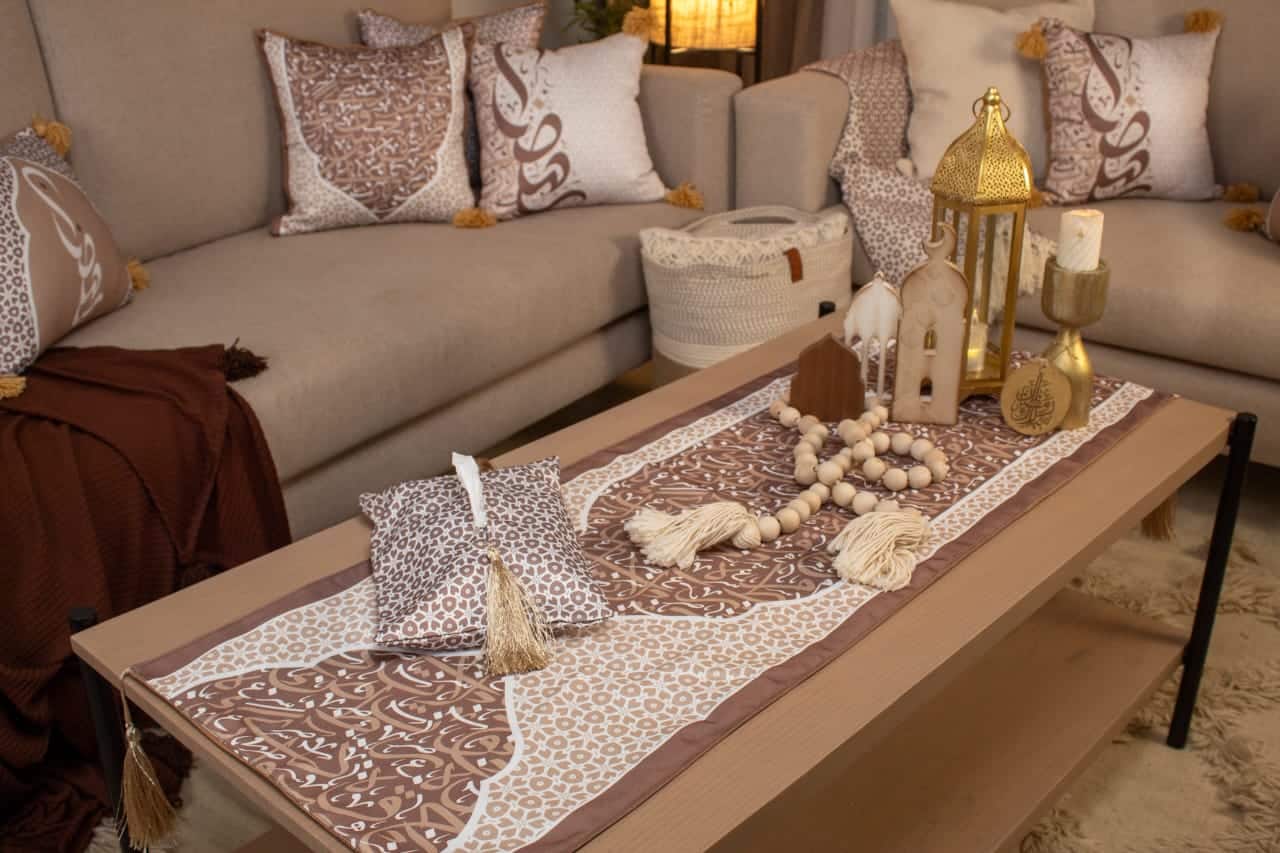 Double-Sided Ramadan Table Runner with Arabic Calligraphy – "أثر" Collection (Mocha 4 Double-sided table runner with Arabic calligraphy and tassels from the 'أثر' collection in mocha tones.