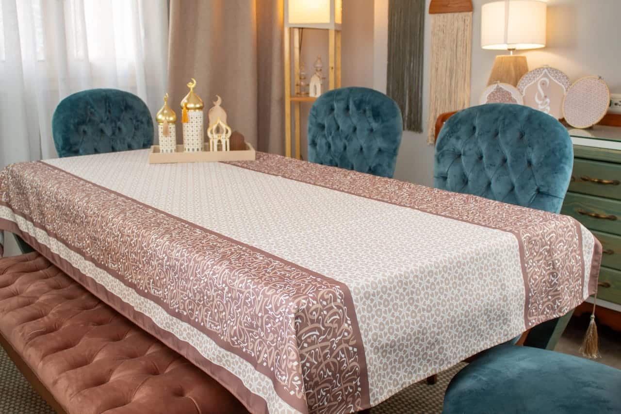 Waterproof Ramadan Dining Table Cover – "أثر" Collection (Mocha Edition) 4 Dining table cover with Arabic calligraphy from the 'أثر' collection in mocha tones.