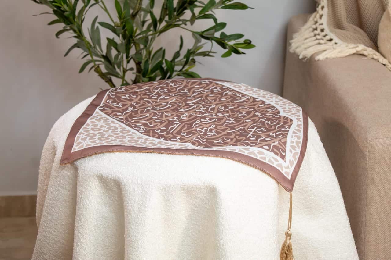 Ramadan Side Table Cover with Arabic Calligraphy – "أثر" Collection (Mocha Edition) 4 Side table cover with Arabic calligraphy from the 'أثر' collection in mocha tones.