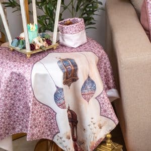 Square table cover with floral patterns from the 'روبا' collection, perfect for Ramadan decor.