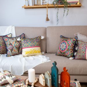 Decorative cushions with fanous motifs from the 'زينة' collection.