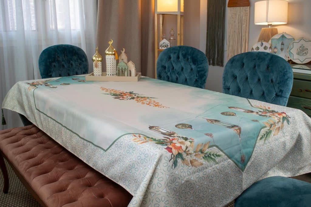 Waterproof dining table cover with intricate Ramadan-inspired patterns, part of the 'Sokoon' collection.