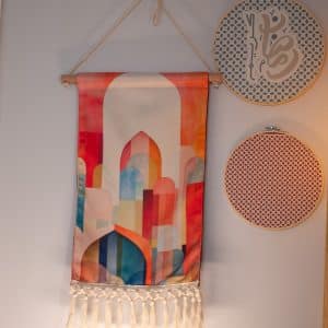 Wall hanging décor with Kufic-inspired patterns from the 'كوفي' collection.