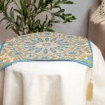 Side table cover from the 'نقوش' collection with geometric patterns, perfect for Ramadan decor.