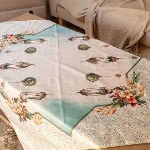 Square table cover with vibrant Ramadan-inspired patterns, part of the 'Sokoon' collection.