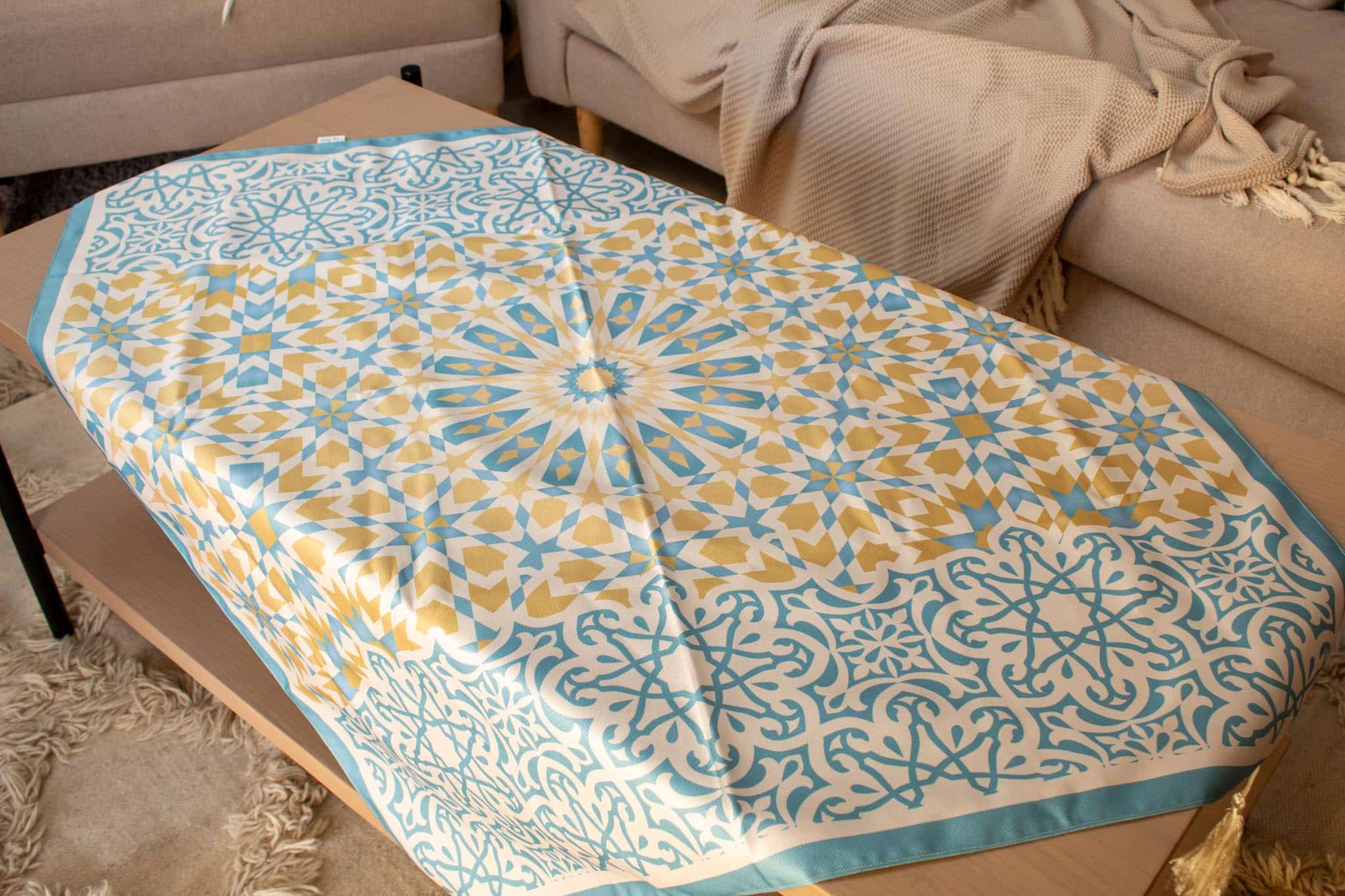 Ramadan Square Table Cover – "نقوش" Collection 4 Square table cover from the 'نقوش' collection with geometric patterns, perfect for Ramadan gatherings.