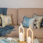 Ramadan cushions from the 'نقوش' collection with geometric patterns and Arabic calligraphy.