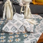 Tissue box cover with floral accents from the ‘ربيع’ collection.