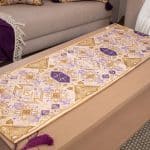 Table runner with intricate ethnic designs from the 'كناريا' collection.