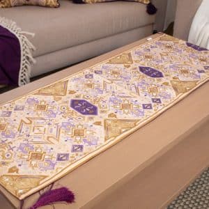 Table runner with intricate ethnic designs from the 'كناريا' collection.